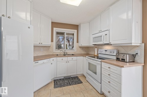 54 Harwood Drive, St. Albert, AB - Indoor Photo Showing Kitchen With Double Sink