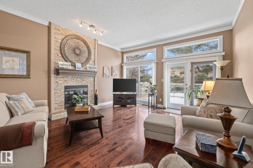 54 Harwood Drive, St. Albert, AB - Indoor Photo Showing Living Room With Fireplace