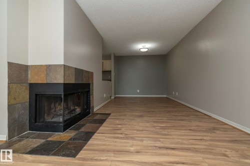 23 14620 26 Street, Edmonton, AB - Indoor With Fireplace