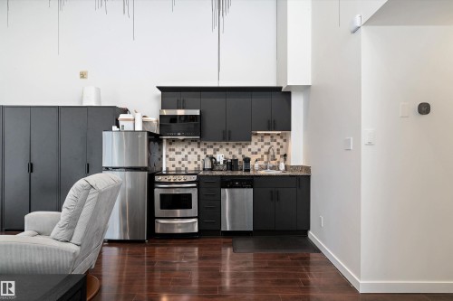 1810 10024 Jasper Avenue, Edmonton, AB - Indoor Photo Showing Kitchen With Upgraded Kitchen