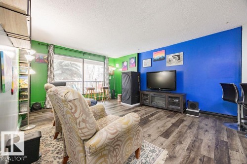 205 12841 65 Street, Edmonton, AB - Indoor Photo Showing Living Room