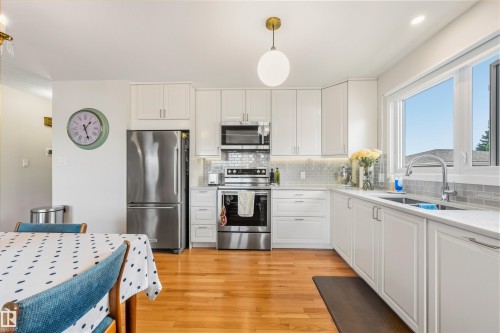 7811 148 Avenue, Edmonton, AB - Indoor Photo Showing Kitchen With Double Sink