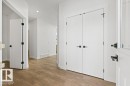 Entryway featuring light wood-style flooring, white walls, and a recessed ceiling light - 5018 53 Avenue, Calmar, AB  - Indoor Photo Showing Other Room 