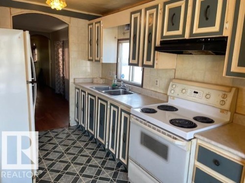 12 Cliff Crescent, Edmonton, AB - Indoor Photo Showing Kitchen With Double Sink