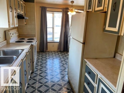 12 Cliff Crescent, Edmonton, AB - Indoor Photo Showing Kitchen With Double Sink