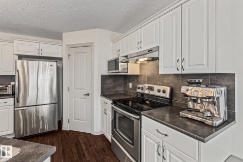 1133 35A Avenue, Edmonton, AB - Indoor Photo Showing Kitchen With Stainless Steel Kitchen