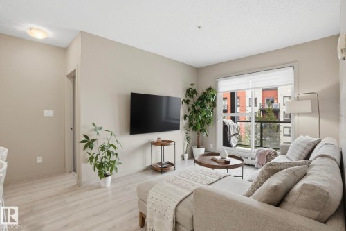 303 320 Ambleside Link Drive, Edmonton, AB - Indoor Photo Showing Living Room