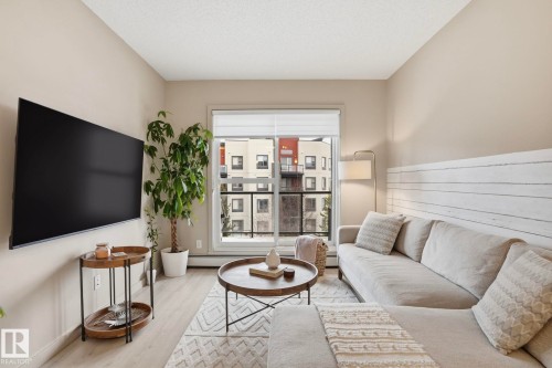303 320 Ambleside Link Drive, Edmonton, AB - Indoor Photo Showing Living Room