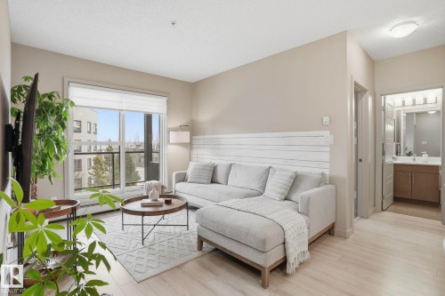 303 320 Ambleside Link Drive, Edmonton, AB - Indoor Photo Showing Living Room