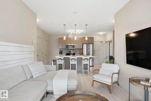 303 320 Ambleside Link Drive, Edmonton, AB - Indoor Photo Showing Living Room