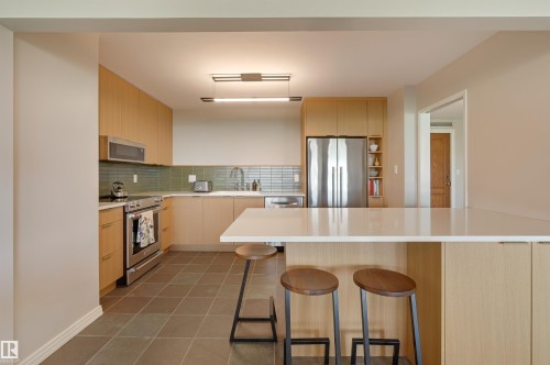 602 9929 Saskatchewan Drive, Edmonton, AB - Indoor Photo Showing Kitchen With Stainless Steel Kitchen