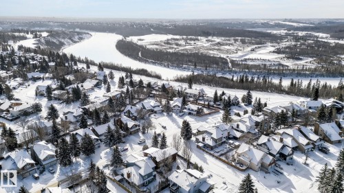 Aerial view of a residential area featuring numerous properties with snow-covered roofs - 5604 174 Street, Edmonton, AB - Outdoor With View