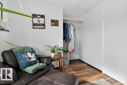 The room features light-colored walls and wood-look flooring - 2655 89 Street, Edmonton, AB - Indoor Photo Showing Other Room