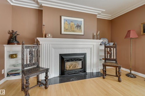 106 St George'S Crescent, Edmonton, AB - Indoor Photo Showing Other Room With Fireplace