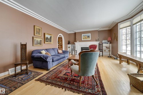 106 St George'S Crescent, Edmonton, AB - Indoor Photo Showing Living Room With Fireplace