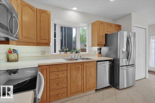 9615 101 Street, Edmonton, AB - Indoor Photo Showing Kitchen With Double Sink