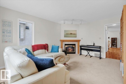 9615 101 Street, Edmonton, AB - Indoor Photo Showing Living Room With Fireplace