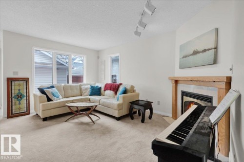 9615 101 Street, Edmonton, AB - Indoor Photo Showing Living Room With Fireplace