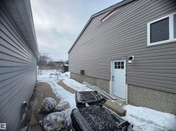 siding being repaired in the next - 