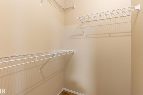 Closet with wire shelving units and light-colored walls - 1233 Ormsby Lane, Edmonton, AB - Indoor With Storage