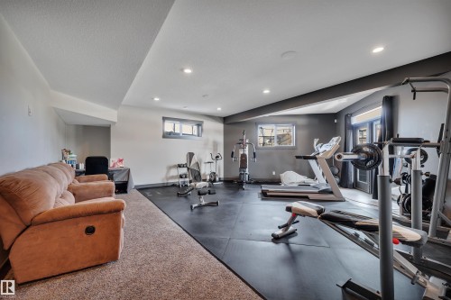 136 Kirpatrick Crescent, Leduc, AB - Indoor Photo Showing Gym Room
