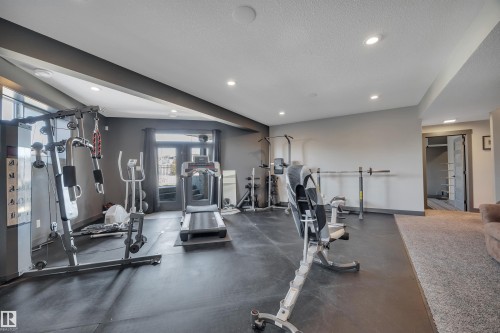 136 Kirpatrick Crescent, Leduc, AB - Indoor Photo Showing Gym Room