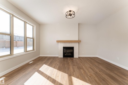 10 Gable Common, Spruce Grove, AB - Indoor Photo Showing Other Room With Fireplace