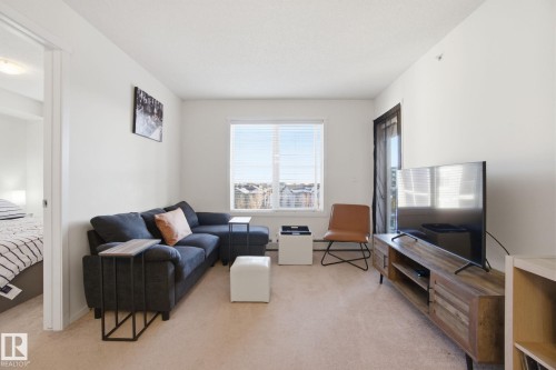 420 3315 James Mowatt Trail, Edmonton, AB - Indoor Photo Showing Living Room