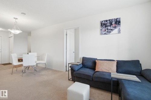 420 3315 James Mowatt Trail, Edmonton, AB - Indoor Photo Showing Living Room