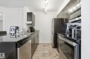 420 3315 James Mowatt Trail, Edmonton, AB  - Indoor Photo Showing Kitchen With Double Sink 