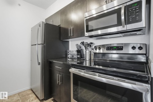420 3315 James Mowatt Trail, Edmonton, AB - Indoor Photo Showing Kitchen
