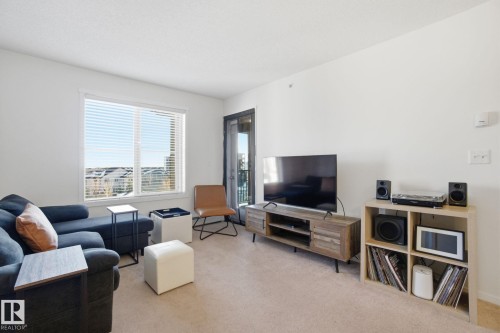 420 3315 James Mowatt Trail, Edmonton, AB - Indoor Photo Showing Living Room
