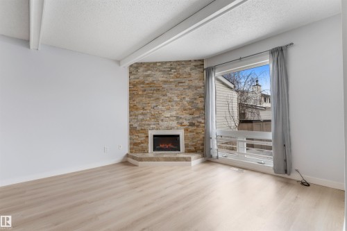 151 Marlborough Place, Edmonton, AB - Indoor Photo Showing Living Room With Fireplace
