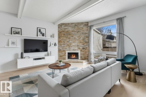 151 Marlborough Place, Edmonton, AB - Indoor Photo Showing Living Room With Fireplace