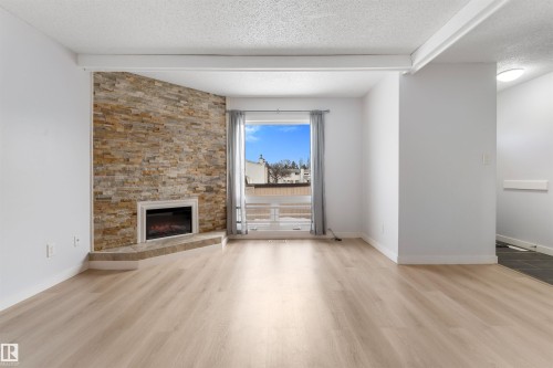 151 Marlborough Place, Edmonton, AB - Indoor Photo Showing Living Room With Fireplace