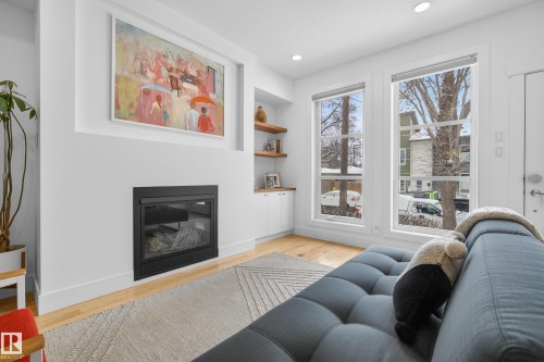 9012 92 Avenue, Edmonton, AB - Indoor Photo Showing Living Room With Fireplace