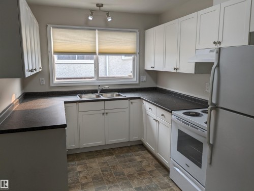 8315 69 Avenue, Edmonton, AB - Indoor Photo Showing Kitchen With Double Sink