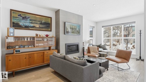 10817 75 Avenue, Edmonton, AB - Indoor Photo Showing Living Room With Fireplace
