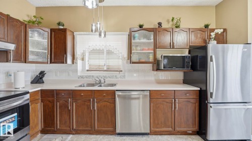 1120 Kane Wynd, Edmonton, AB - Indoor Photo Showing Kitchen With Double Sink