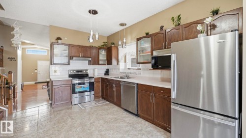 1120 Kane Wynd, Edmonton, AB - Indoor Photo Showing Kitchen With Double Sink