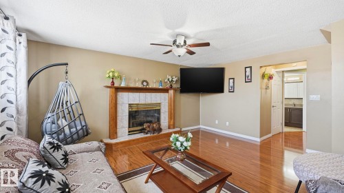 1120 Kane Wynd, Edmonton, AB - Indoor Photo Showing Living Room With Fireplace