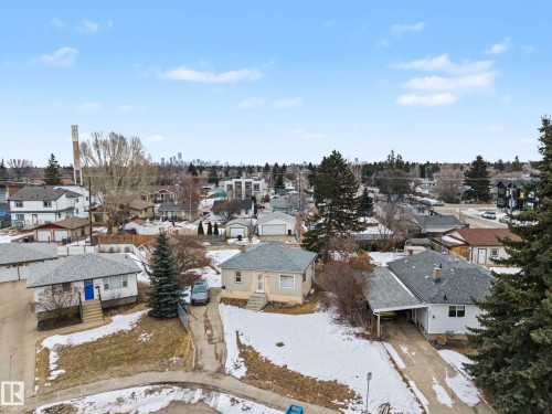 Aerial view of the neighborhood showcasing a single-story property with a light-colored exterior and a dark roof - 9409 154 Street, Edmonton, AB - Outdoor With View