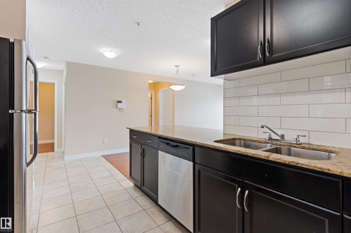 103 12660 142 Avenue, Edmonton, AB - Indoor Photo Showing Kitchen With Double Sink