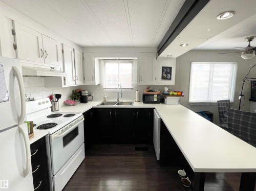 4908 55 Avenue, Camrose, AB - Indoor Photo Showing Kitchen With Double Sink