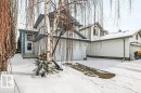 The property features a white exterior, an attached garage, and a driveway - 902 Graham Wynd, Edmonton, AB  - Outdoor 