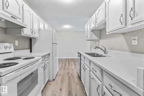 502 10125 109 Street, Edmonton, AB - Indoor Photo Showing Kitchen With Double Sink