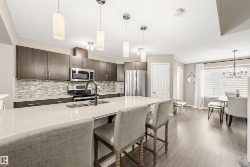 3229 Cherry Crescent, Edmonton, AB - Indoor Photo Showing Kitchen With Stainless Steel Kitchen With Double Sink With Upgraded Kitchen