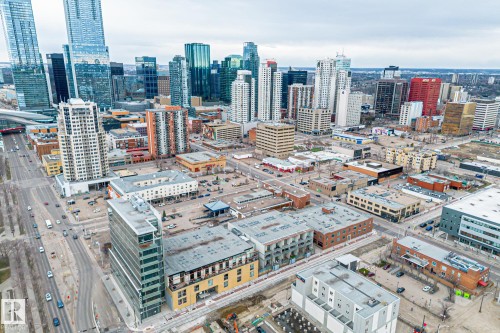 Aerial view showcasing the urban landscape with numerous high-rise buildings and commercial properties - 314 10309 107 Street, Edmonton, AB - Outdoor With View