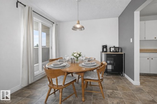 407 5125 Riverbend Road, Edmonton, AB - Indoor Photo Showing Dining Room