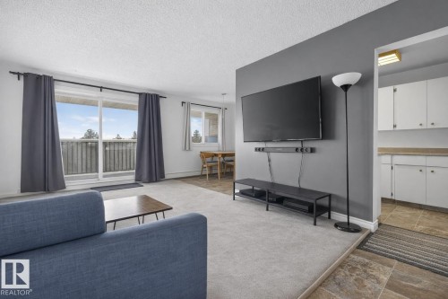 407 5125 Riverbend Road, Edmonton, AB - Indoor Photo Showing Living Room